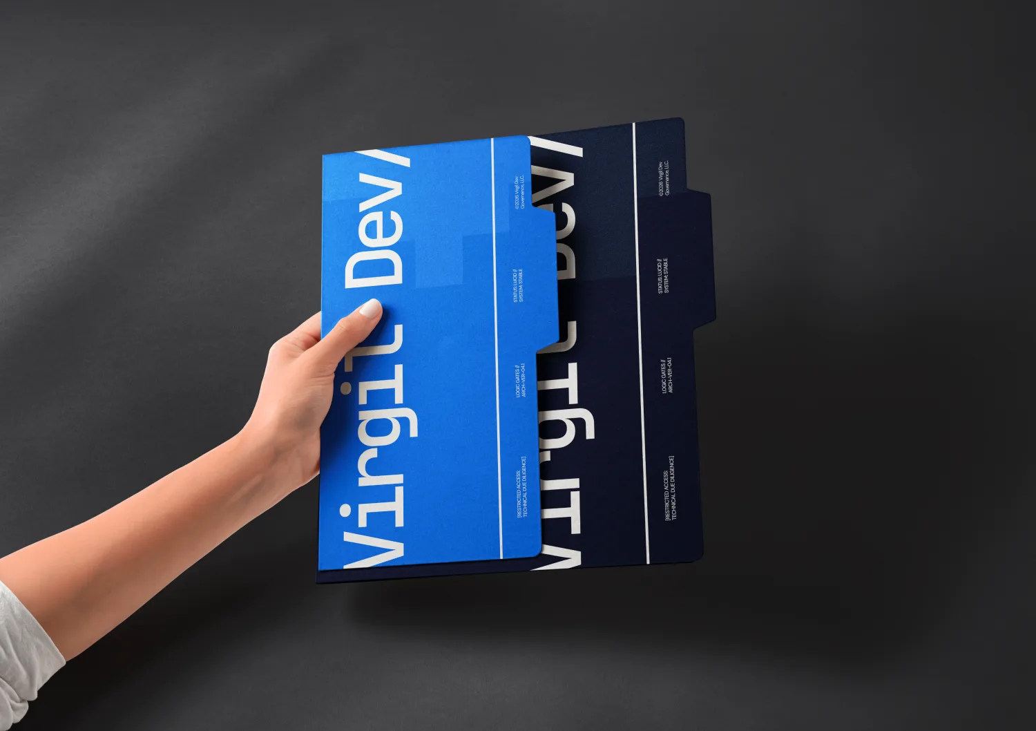 Virgil Dev brand applied to stationery folder mockup